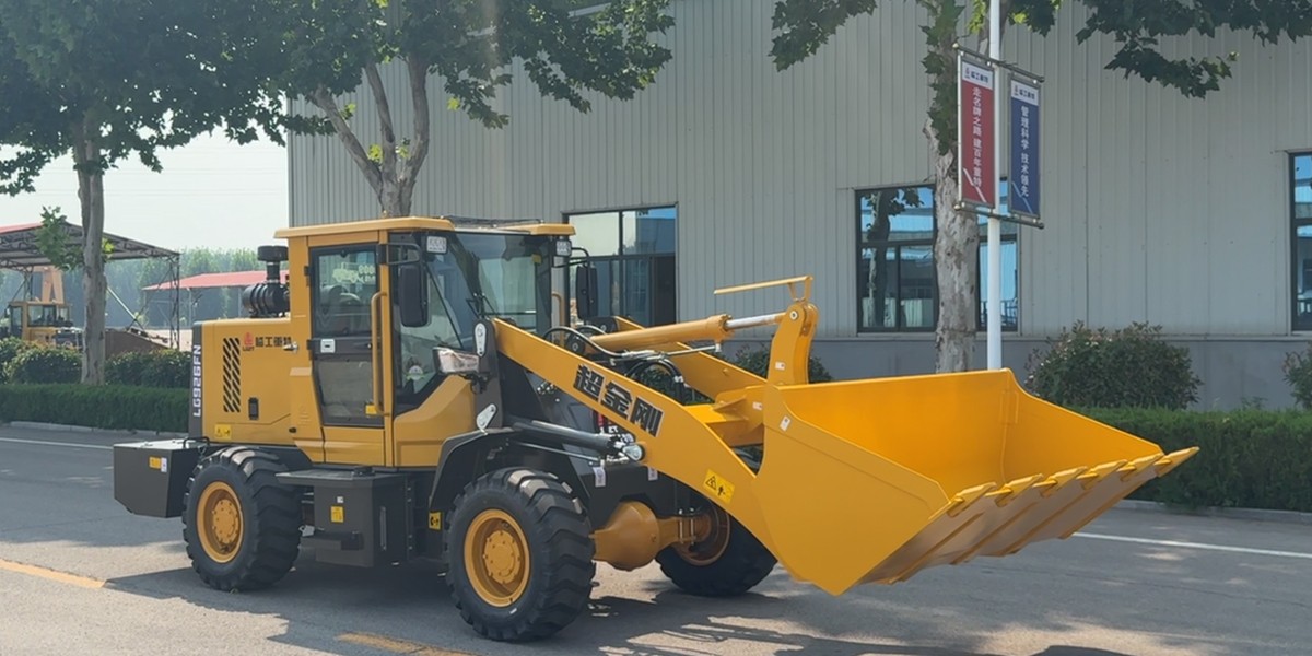 Малый шарнирно-сочлененный погрузчик Малый шарнирно-сочлененный погрузчик