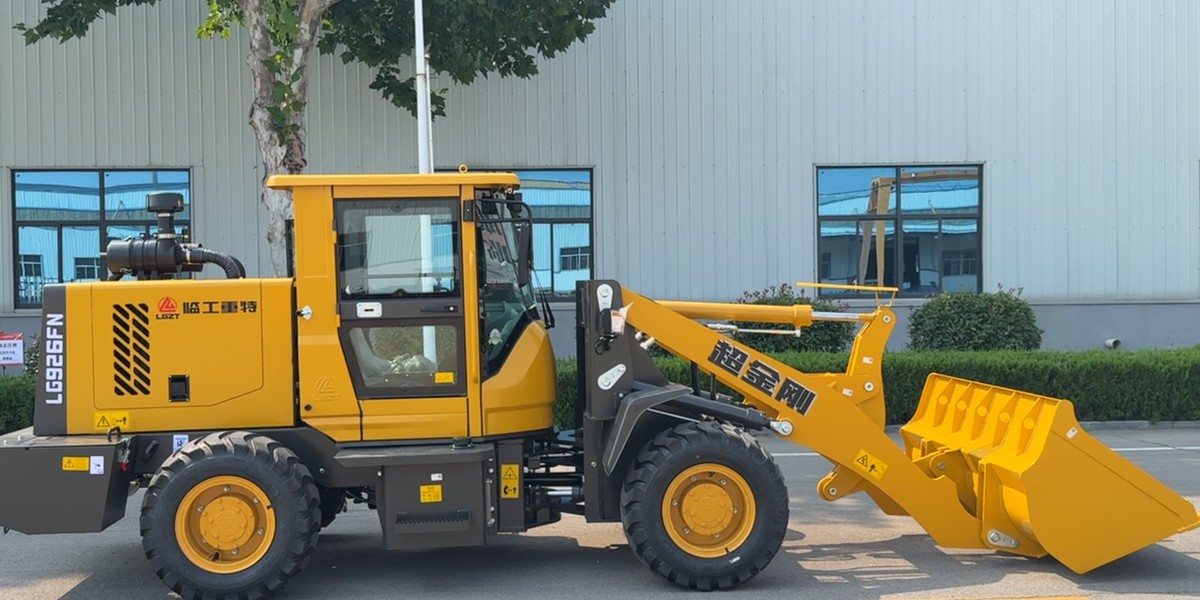 Малый шарнирно-сочлененный погрузчик Малый шарнирно-сочлененный погрузчик