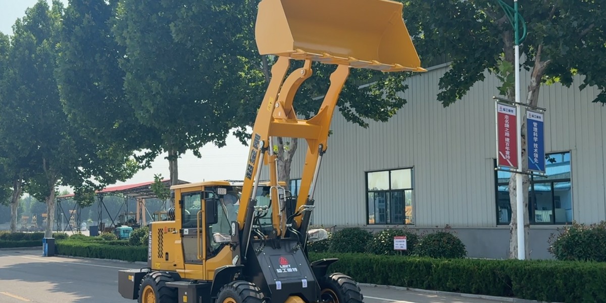 Малый шарнирно-сочлененный погрузчик Малый шарнирно-сочлененный погрузчик